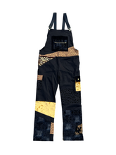 Load image into Gallery viewer, 1 of 1 BLK N GLD PATCHWORK OVERALLS (Size - M/L