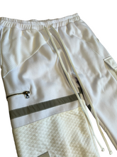 Load image into Gallery viewer, 1 of 1 WHITE LIGHT PATCHWORK PANTS (M/L 32-34” waist)